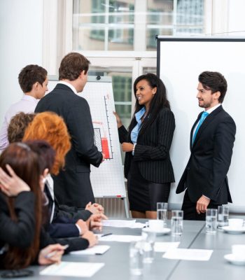 business team in office meeting presentation conference people teamwork